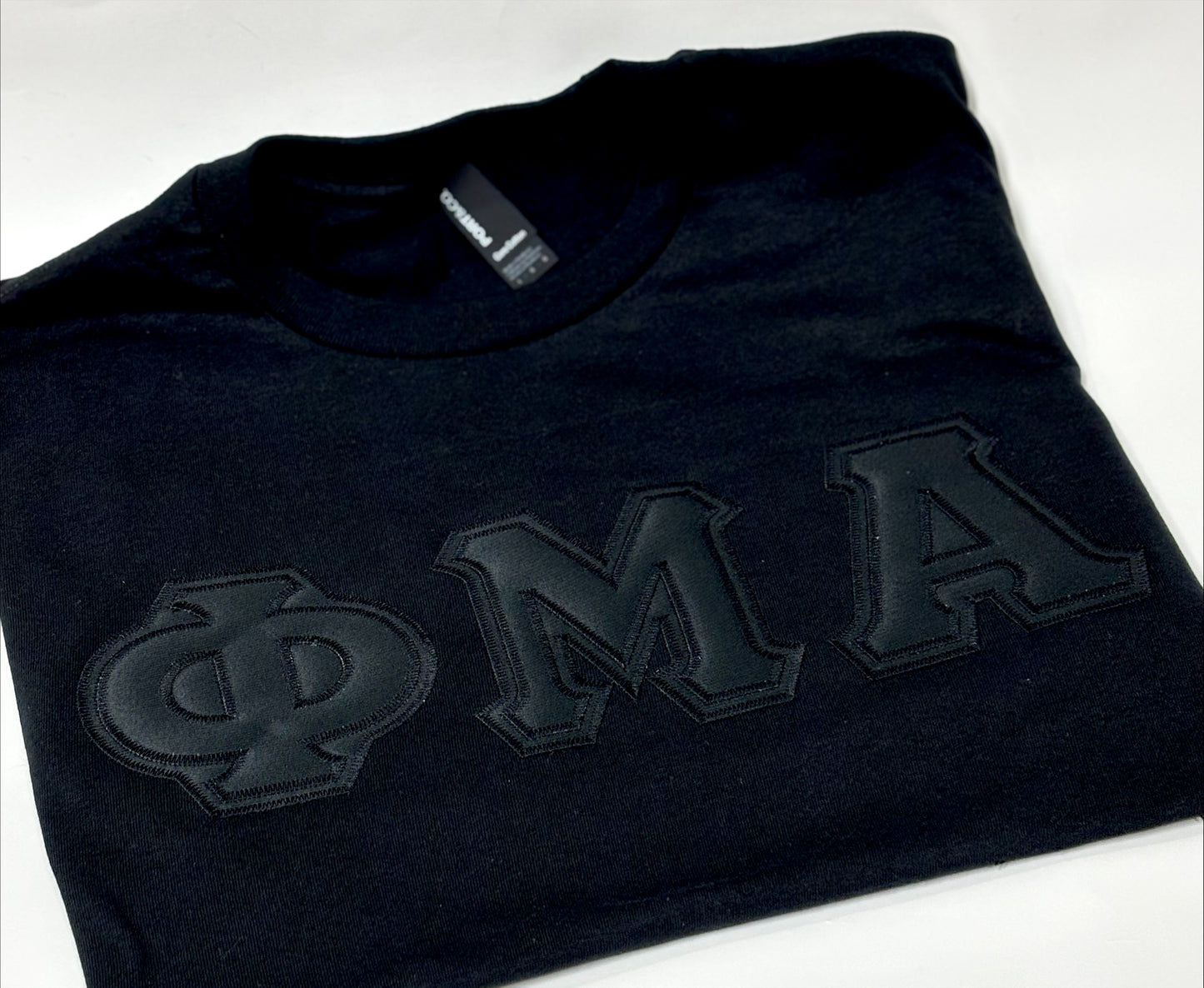 BLACKOUT Sewn-On Greek Letter T-Shirt